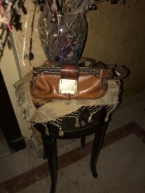 Lady bag natural leather with copper as accessory